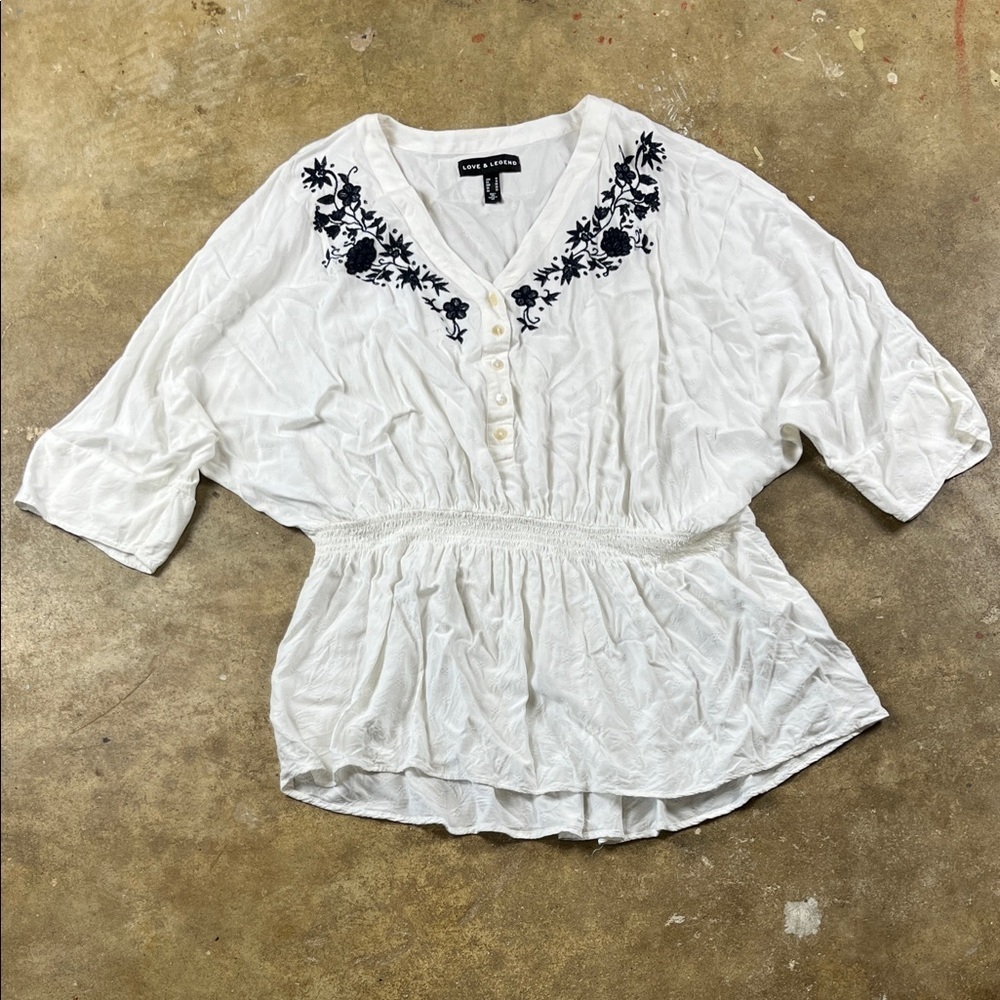 Love & Legend White Blouse with Navy Floral Embroidery
Size: 16